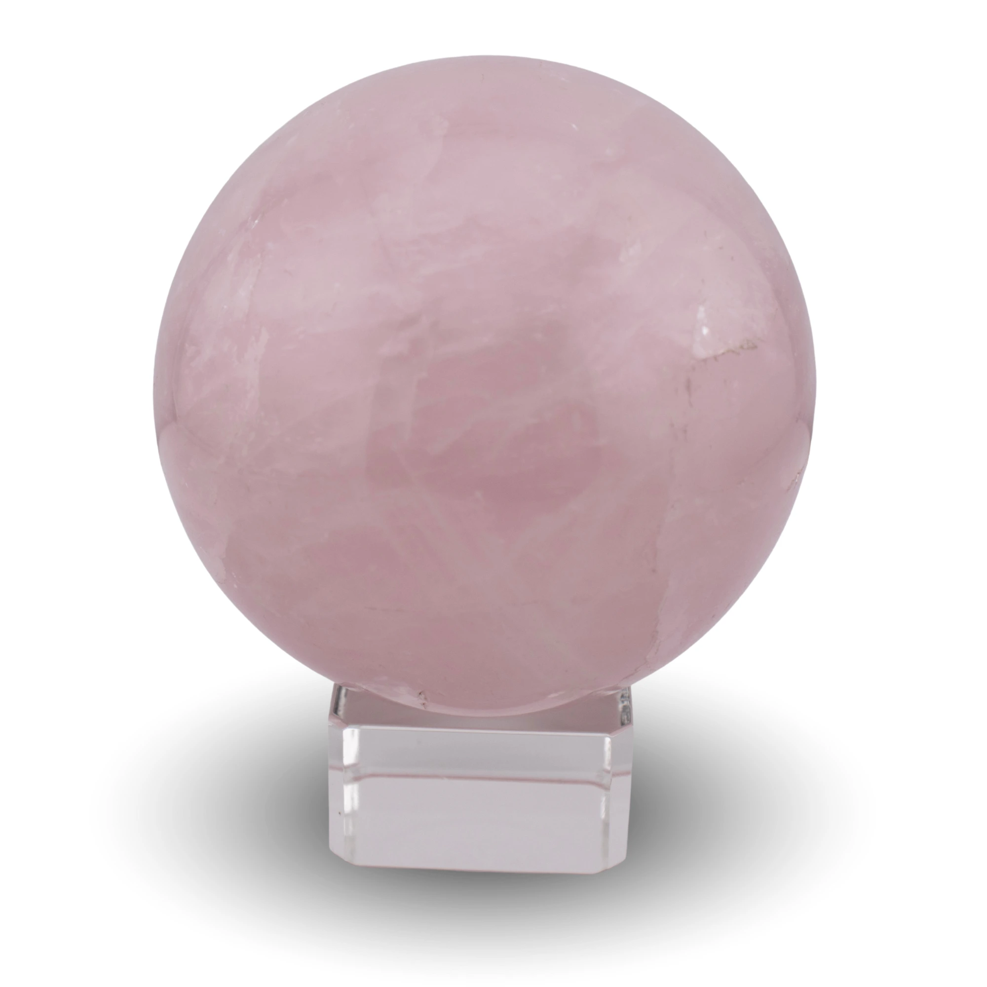 Rose quartz sphere on glass stand
