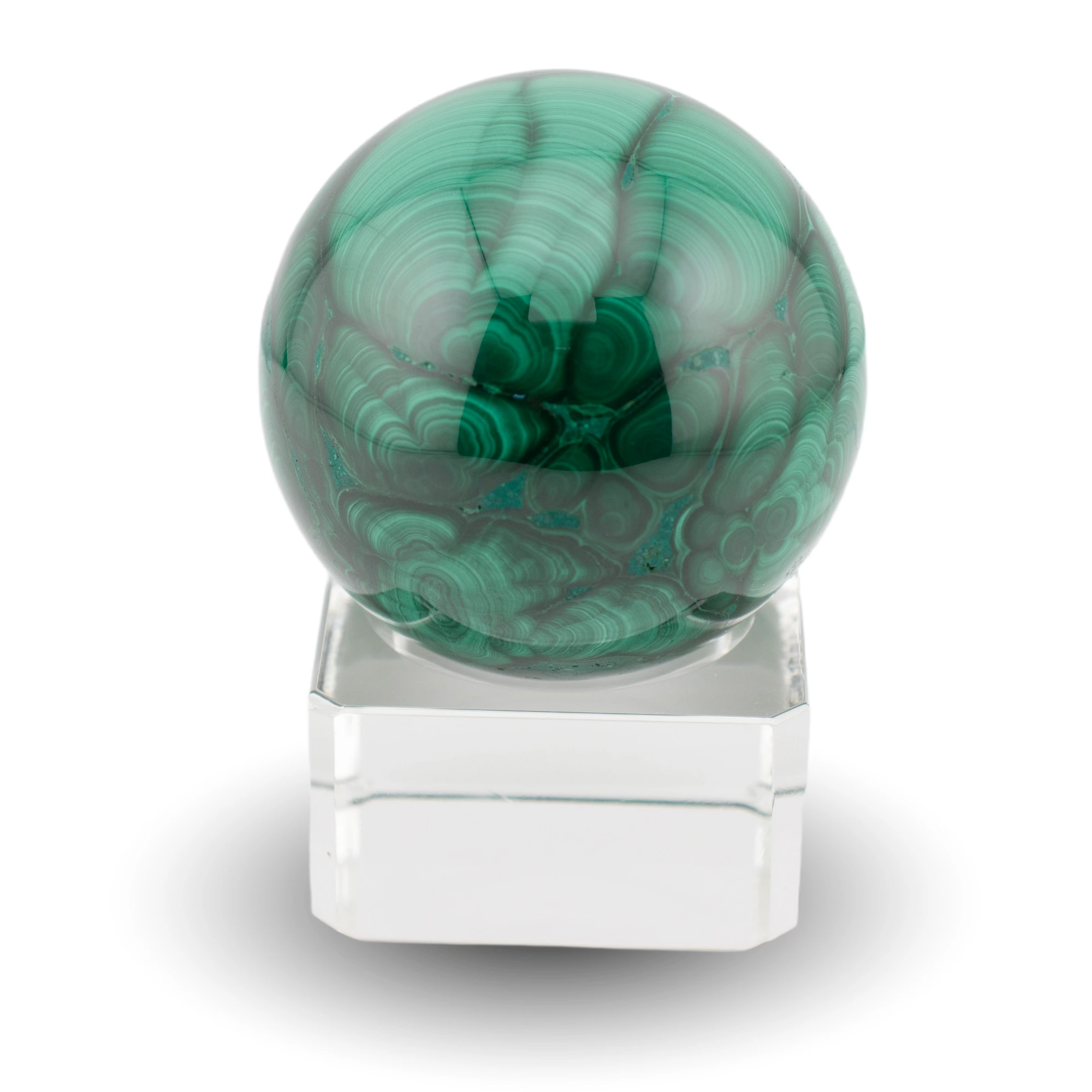 Malachite sphere on glass stand